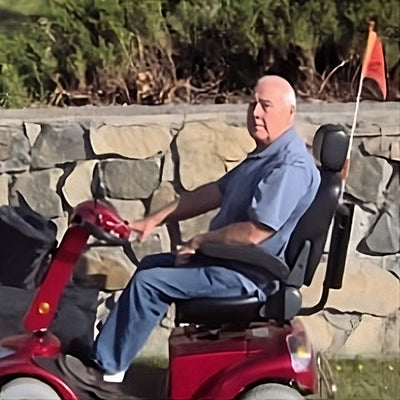 Gordon, A happy scooter rider